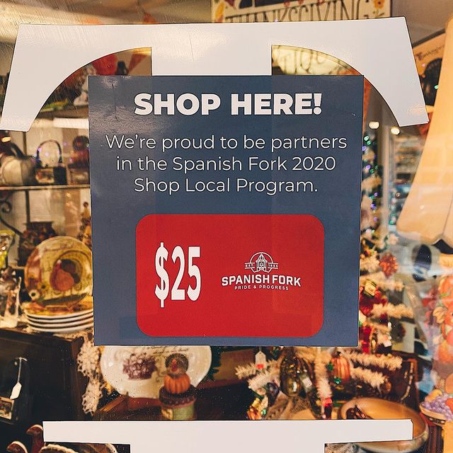 Photo by Confetti Antiques and Books on November 24, 2020. Image may contain: text that says 'SHOP HERE! We're proud to be partners in the Spanish Fork 2020 Shop Local Program. $25 SPANISH FORK PRIDE& SPANISHFORK PROGRESS'.